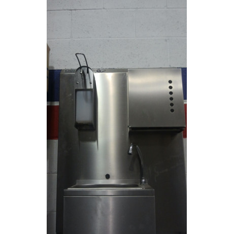 Wall Sink with sensor and soap dispenser.