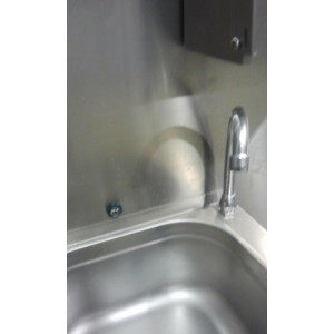 Wall Sink with sensor and soap dispenser.